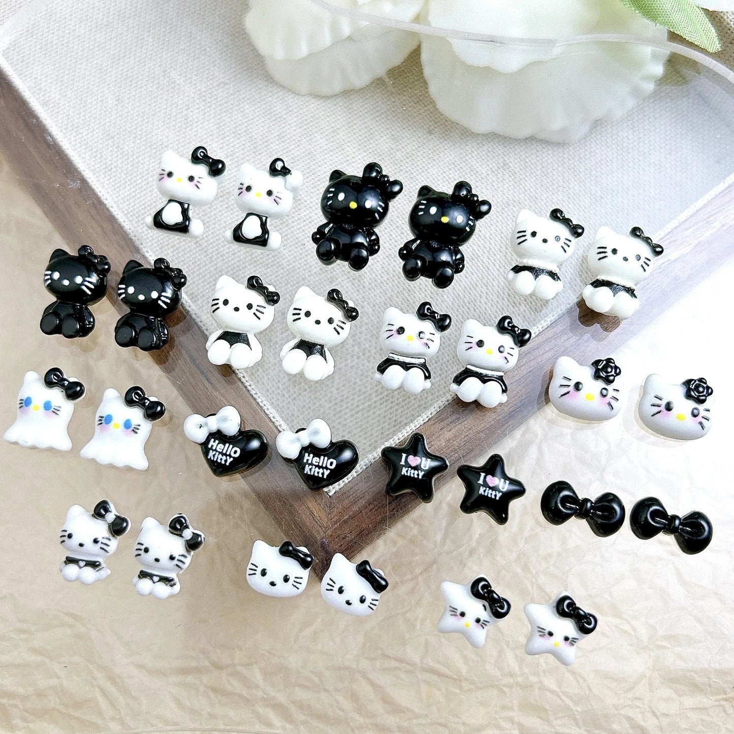 50Pcs Black and White Hello Kitty Nail Charms Cute 3D Heart and Bowtie Nail Art Accessories for a Stylish and Adorable Manicure