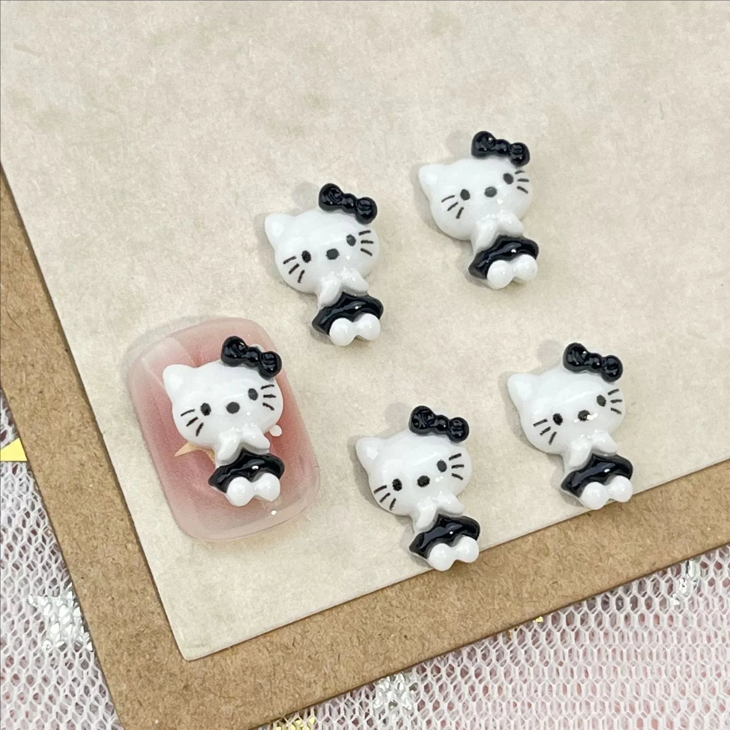 50Pcs Black and White Hello Kitty Nail Charms Cute 3D Heart and Bowtie Nail Art Accessories for a Stylish and Adorable Manicure
