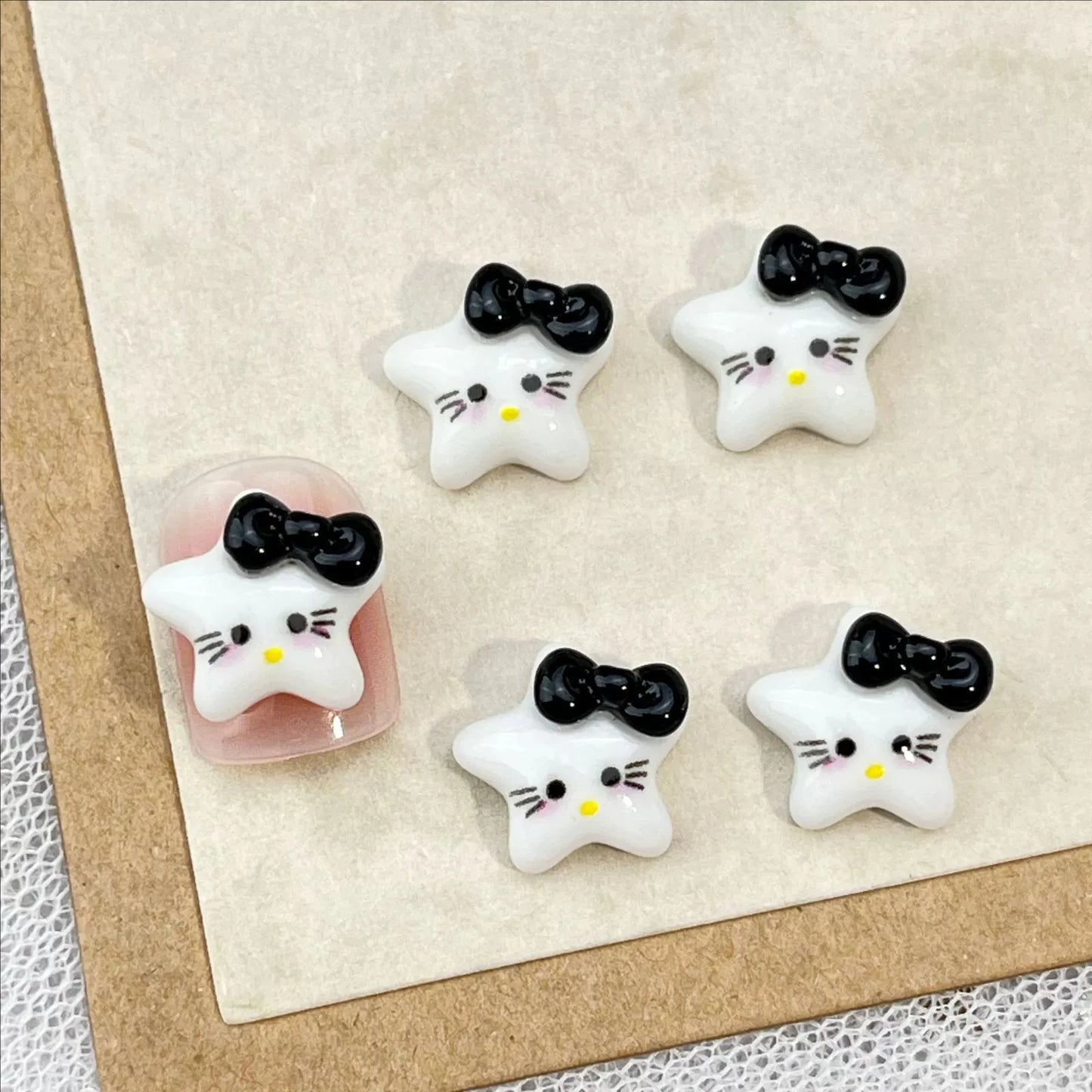 50Pcs Black and White Hello Kitty Nail Charms Cute 3D Heart and Bowtie Nail Art Accessories for a Stylish and Adorable Manicure