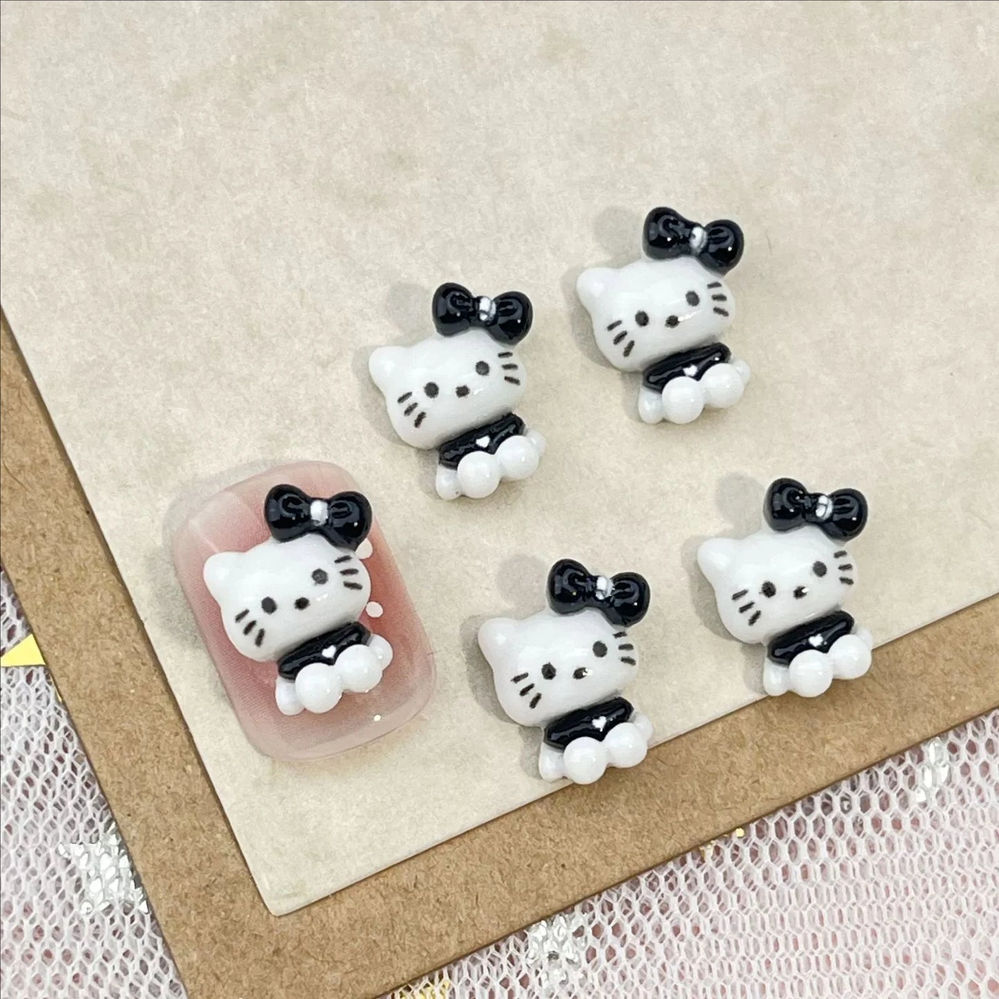 50Pcs Black and White Hello Kitty Nail Charms Cute 3D Heart and Bowtie Nail Art Accessories for a Stylish and Adorable Manicure