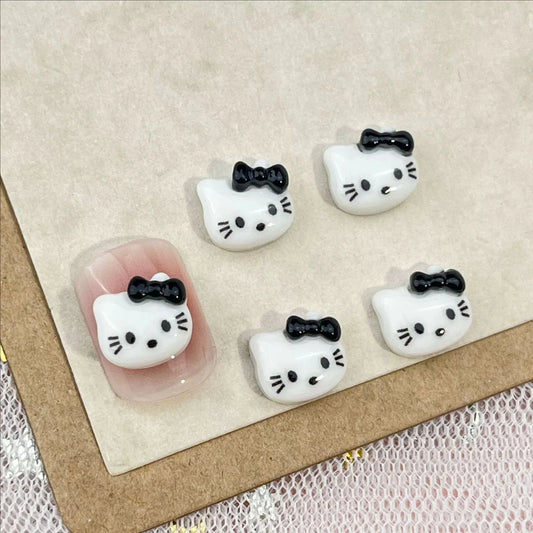 50Pcs Black and White Hello Kitty Nail Charms Cute 3D Heart and Bowtie Nail Art Accessories for a Stylish and Adorable Manicure